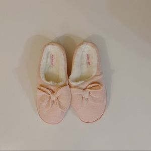 Pink fuzzy slippers